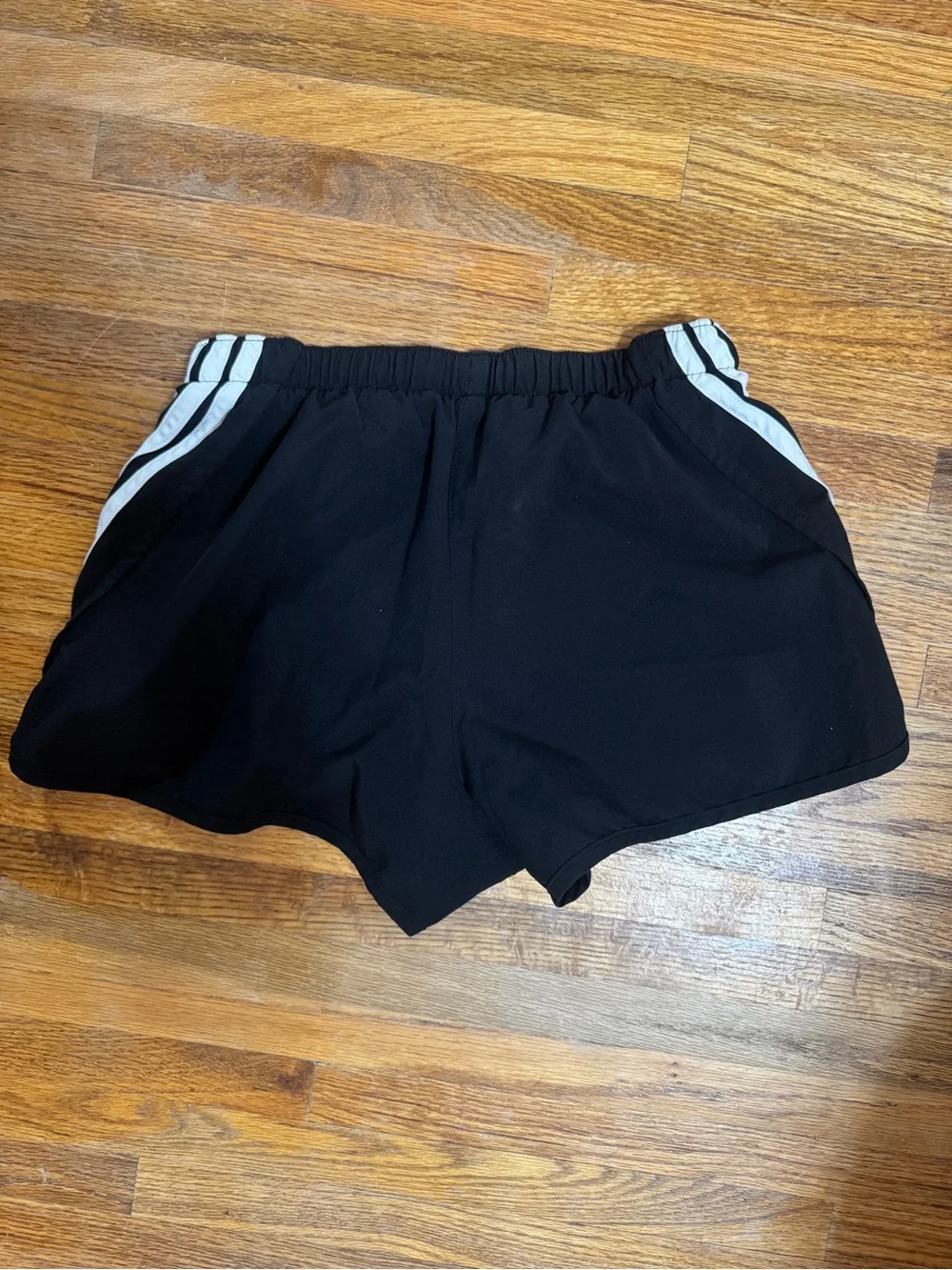 adidas Black Athletic Shorts with White Stripes and Husker Red Accent Logo